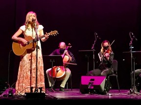Stratford singer-songwriter Dayna Manning performs onstage with INNERchamber orchestra members Ben Bolt Martin and Laura Chambers during a recent concert in Moosejaw, Sask. Photo by Gord Barnett