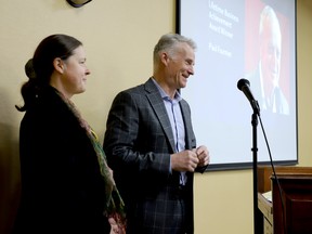 Alyson and Mark Fournier accept the posthumous Lifetime Business Achievement Award given to their father, Paul, by the Brockville and District Chamber of Commerce on Thursday morning. (RONALD ZAJAC/The Recorder and Times)