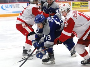 Kocha Delic, left, of the Sudbury Wolves, battles for the puck with Bryce McConnell-Barker, of the Soo Greyhounds, during OHL action at the Sudbury Community Arena March 9 in Sudbury. McConnell-Barker was the Greyhounds representative at the CHL Prospects Game on March 23. John Lappa/Sudbury Star/Postmedia Network