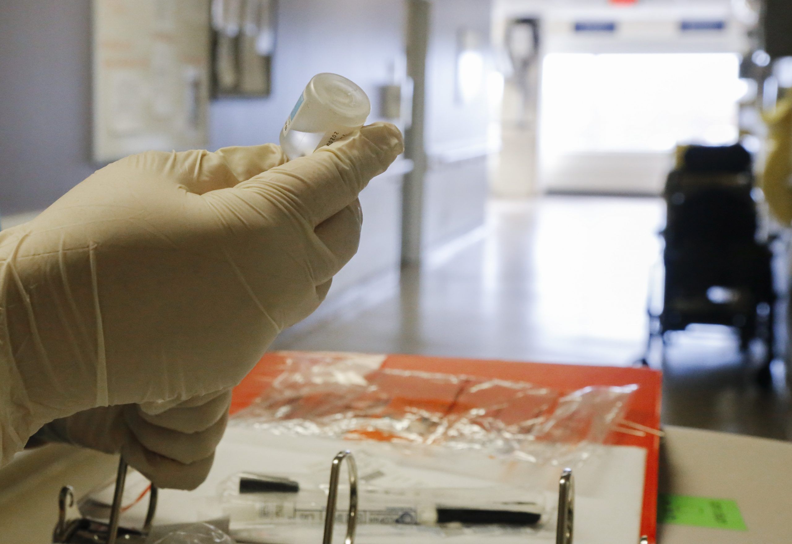A nurse prepares medication in a Belleville General Hospital hallway in 2017. Advocates for public health care are raising the alarm about the risks of private care and calling for Ontarians to oppose what they say is shift toward privatization by the provincial government.