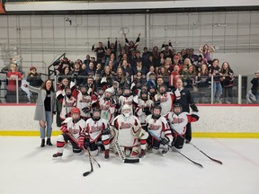 The Fort Saskatchewan U13 Fury pose with family and friends after their league championship win. Photo supplied.