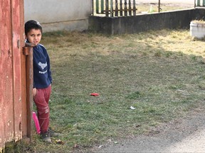 Ukrainian refugee children is seen at the facilities of the Hungarian Protestant church after they crossed the Ukrainian-Hungarian border in Tiszabecs, Hungary, on Feb. 27, 2022.