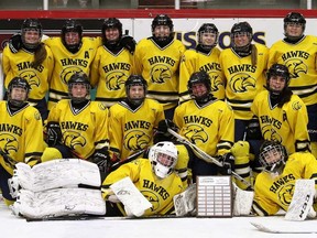 The Chatham-Kent Golden Hawks celebrate their 3-2 win over the Ursuline Lancers in the LKSSAA 'AAA' girls' hockey final at Chatham Memorial Arena in Chatham, Ont., on Wednesday, March 9, 2022. Mark Malone/Chatham Daily News/Postmedia Network