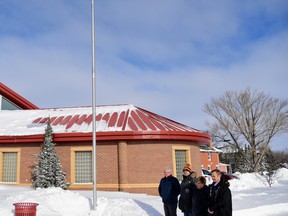 City staff and officials raised the Ukrainian flag outside Melfort's city hall on Tuesday, Mar. 8. Omar Sherif / The Journal