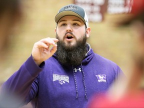 Western Mustangs defensive lineman Austin Fordham-Miller talks to players at a Chatham-Kent Cougars football clinic at John McGregor Secondary School in Chatham, Ont., on Sunday, March 6, 2022. (Mark Malone/Chatham Daily News/Postmedia Network)