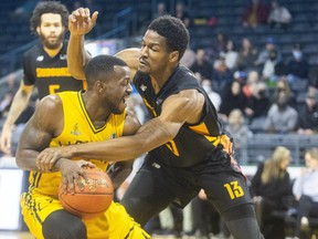 Chris Jones of the London Lightning doesn't get the foul call as Marcel White of the Sudbury Five grabs his arm during their CBL league game at Budweiser Gardens on Thursday March 24, 2022.