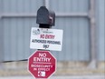 A sign at the entrance to a turkey farm on Oxford County in 2015 notifies visitors of enhanced biosecurity measures following an outbreak of bird flu. A new strain of bird flu has been found at three southern Ontario farms, including one near Thamesford. File photo