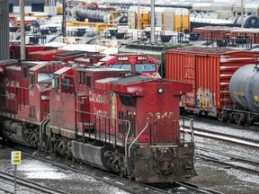 CP Rail trains are seen at the company’s Calgary Alyth Yards on Sunday, when operations were halted because of the labour dispute. PHOTO BY GAVIN YOUNG/POSTMEDIA