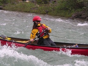 Tina Barzo paddles rapids near Lake Louise. 
photo submitted