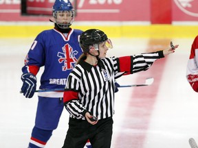 Brandy Dewar-Beecroft (shown here) in action as Team Denmark takes on Team Great Britain in IIHF women's hockey action. On Feb. 20 Dewar-Beecroft became the first woman to officiate a NOJHL game.