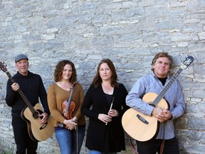 Pictured are members of the Prince Edward County-based folk band, Seventh Town. The band will perform its first live St. Patrick's Day performance in three years, at Belleville's Sans Souci on March 17. Pictured are band members (from left) Fraser Hardman on bass and vocals, Meghan Balogh on fiddle and vocals, Trisha Elliott on whistles and vocals and Martin Smit on guitar and vocals. SUBMITTED