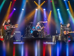 The Stampeders rock the Empire Theatre in Belleville, Ont., on Tuesday night during their 50-year celebration tour. From left, Rich Dodson (guitar, vocals), Kim Berly (drums, vocals) and Ronnie King (bass, vocals). ALEX FILIPE/Postmedia Network