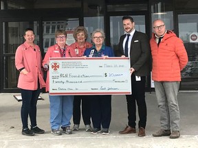 BGH Auxiliary executive members present a cheque to foundation officials March 23 at the hospital. From left were members  Kirsten Busse, Sharon Ostman, President Leah Johnson, and Angela Ford with foundation executive director Steven Cook and foundation finance chairperson Peter Knudsen.