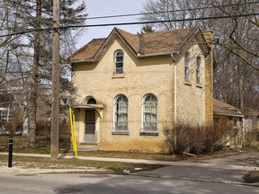 City councillors are considering purchasing and demolishing a house at 159 Dufferin Ave., near Christ the King School, to create a secondary pedestrian pathway leading into Dufferin Park.