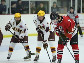 From left, Andrew Spargue and Colton Fenlong of Athens and Nick McLeod of Brockville prepare for a faceoff near the end of the Aeros-Tikis game at the Memorial Centre on Friday. Sprague scored a hat trick and picked up three assists in the 7-0 victory for Athens.
Tim Ruhnke/The Recorder and Times