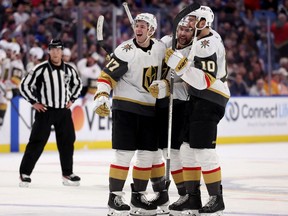 Vegas defenceman and South Grenville District High School alumnus Ben Hutton (left) celebrates his goal with teammates during the third period of the Golden Knights-Sabres game Thursday night. Hutton's goal tied the game; the Sabres went on to win 3-1 in Jack Eichel's return to Buffalo.