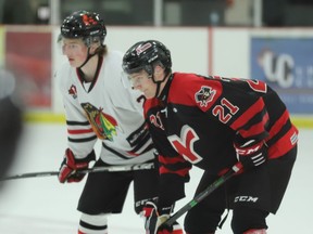 Brockville's Jack McDonald (left) and Jack Hillier of Nepean line up for a faceoff during the Braves-Raiders game on Thursday, March 10. McDonald picked up a goal and four assists and was named first star in the Braves' 7-2 victory at home Friday night.
File photo/The Recorder and Times