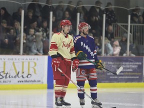 Derek Froats (left) and Tanner Spink chat during a stoppage in play at the North Dundas-South Grenville playoff game on Saturday night. Almost 500 were on hand to watch the visiting Rockets down the Sr. Rangers. North Dundas won the best-of-three series in Chesterville Sunday night and will now face Gananoque in the EOSHL finals.
Tim Ruhnke/The Recorder and Times