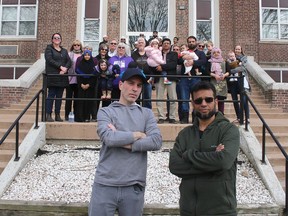 Jeff Piche (left) and Mohammed Khaja have been speaking on behalf of their neighborhood over concerns about receiving no notification that a proposed emergency shelter for homeless people at a former school at 185 Murray St. Chatham-Kent council, however, agreed to the shelter plan on Monday. Piche and Khaja were joined by other residents concerned about the impact to the community, including at the Darul Uloom School where dozens of children live while studying at the private school. Ellwood Shreve/Postmedia