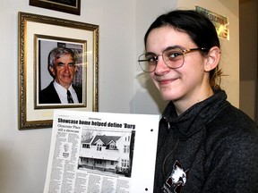 Wallaceburg and District Museum curator Kaelyn Gregory holds a column by local historian, the late Al Mann, (seen in photo) detailing the history of Gloucester Place, located at 315 Elgin St. in Wallaceburg. The home was destroyed by fire on Feb. 17, 2022 that killed three people. PHOTO Ellwood Shreve/Chatham Daily News