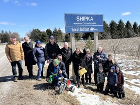 Bulgarian Consul General Velislava Panova visited South Huron on March 29. Of particular interest to her was the village of Shipka because there is also a small town in Bulgaria named Shipka. Pictured in back from left are John Muller, Susi Muller, Janet Van Kout, Andy Van Kout, South Huron Deputy Mayor Jim Dietrich, Panova, Cecile Muller, Allan Barnes, and Danielle, Benedict, Philip and Thomas Roelands; in front are William and Justin Muller. Handout