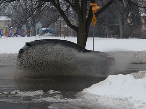 A car splashes through a puddle on Ninth St. in Cornwall on Sunday morning. Photo on Sunday, March 6, 2022, in Lancaster, Ontario.Todd Hambleton/Standard-Freeholder/Postmedia Network
