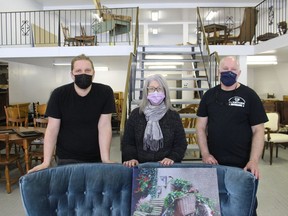 Agape Centre executive director Lisa Duprau, with Furniture Partners employees Matthew Small (left) and Bob Chisholm. Photo on Wednesday, March 9, 2022, in Cornwall Ontario.Todd Hambleton/Standard-Freeholder/Postmedia Network