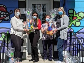 Bereaved Families of Ontario - South Eastern Region representatives, with a presentation at Big Brothers Big Sisters, as part the inaugural Easter Basket Program.Handout/Standard-Freeholder/Postmedia Network
