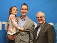 Nolan Quinn, left, holding his daughter Nevyn, with MPP Jim McDonell. Quinn was selected as the next candidate for the Ontario PC Party in Stormont-Dundas-South Glengarry on Saturday March 26, 2022 in Cornwall, Ont. Shawna O'Neill/Cornwall Standard-Freeholder/Postmedia Network