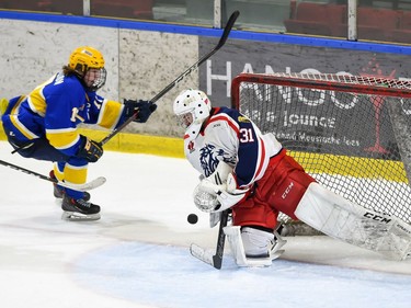 Cornwall Colts goaltender Emile Savoie blocks a shot from Carleton Place Canadians Derek Hamilton on Thursday March 24, 2022 in Cornwall, Ont. The Colts won 4-2. Robert Lefebvre/Special to the Cornwall Standard-Freeholder/Postmedia Network
