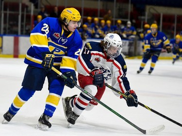 Cornwall Colts Alex Fournier stays ahead of Carleton Place Canadians Marco Iozzo during play on Thursday March 24, 2022 in Cornwall, Ont. The Colts won 4-2. Robert Lefebvre/Special to the Cornwall Standard-Freeholder/Postmedia Network