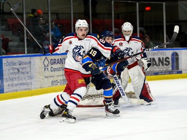 Cornwall Colts Kobe Tallman, left, puts the squeeze on Renfrew Wolves Mathieu Parent in front of the Cornwall crease during play on Thursday March 3, 2022 in Cornwall, Ont. Cornwall won 3-2. Robert Lefebvre/Special to the Cornwall Standard-Freeholder/Postmedia Network