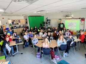 A Grade 6 class and their teacher Mr. Belsey on March 24 in the RancheView school classroom where they assembled the presentation they made to council three days prior. Patrick Gibson/Cochrane Times