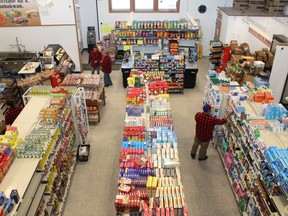 Staff stock shelves at the K'ai Taile Market in Fort Chipewyan on Thursday, January 16, 2020. The grocery store is supported by the Athabasca Chipewyan First Nation as a response to high food prices in the northern hamlet. Vincent McDermott/Fort McMurray Today/Postmedia Network