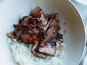 Strip Loin Steaks with Garlic-Sake Sauce. Foodandwine.com photo