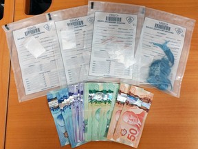 Cocaine, cash and items typically associated with drug trafficking were seized from a Napanee residence on Bridge Street on Tuesday morning.