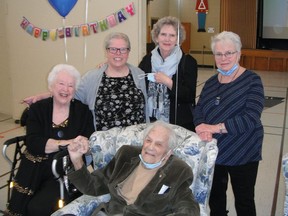 Longtime Whig-Standard circulation manager Stu Crawford, front, is surrounded by "my staff" at his recent 100th birthday gathering, from left, Nancy Folger, Lisa Crawford, Brenda Porteous and Carolyn Chapman