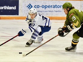 Rookies Luke Misa of the visiting Mississauga Steelheads and Nic Sima of the North Bay Battalion vie for the puck in their Ontario Hockey League game Thursday night. The Battalion hosts the Barrie Colts on Sunday. Sean Ryan