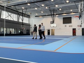 Guests tour the Kingston East Community Centre in Kingston, Ont. on Monday, March 21, 2022. Elliot Ferguson/The Kingston Whig-Standard/Postmedia Network