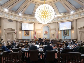 Kingston city councillors meet in person for the first time since March 2020 when they switched to virtual meetings at the start of the COVID-19 pandemic in Kingston, Ont. on Tuesday, March 22, 2022. Eleven councillors attended the meeting in person with two more joining via video link in the city's first every hybrid council meeting. 
Elliot Ferguson/The Whig-Standard/Postmedia Network