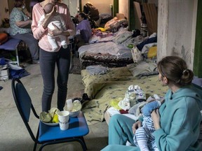 Mothers and their babies shelter in the basement of a pediatric hospital in Kyiv, Ukraine. Amnon Gutman/Save the Children
