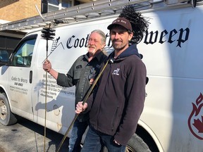 Randy Cooke, left, and Alex Dowell of Cookie the Sweep with some brushes used in the cleaning of chimneys. Patrick Kennedy/For The Whig-Standard/Postmedia Network