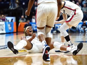 University of Connecticut Huskies forward Aaliyah Edwards (3) reacts after being fouled by the University of Central Florida Knights in the second half of an NCAA women's basketball tournament second-round game on Monday in Storrs, Conn.