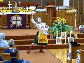 Organizer Deb Donaldson performed a special liturgical dance to the Ukrainian folk song, Dearest Mother of Mine, as part of the Vigil for Peace for Ukraine held at Grace United Church in Gananoque on March 6.  
Supplied by Vigil for Peace for Ukraine