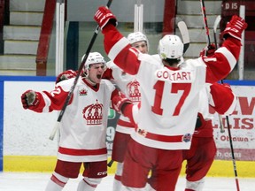 Pembroke Lumber Kings' forward Joe Jordan celebrates with teammates after scoring the game-winning goal March 6 at the PMC. Reece Proulx earned the shutout as the Kings blanked the Hawks 2-0.