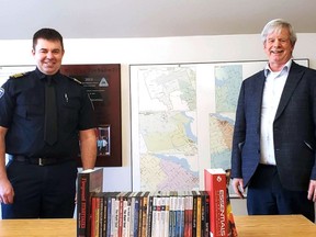 The Whitewater Region Fire Department has received a grant from Enbridge Gas, which was used to purchase firefighting training materials through the Safe Community Project Assist program. Celebrating the grant are Fire Chief Jonathan McLaren (left) and Mayor Michael Moor.