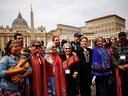 Metis National Council president Cassidy Caron poses for a group picture alongside Metis residential school survivor Angie Crerar, 85, and other delegates from Canada's indigenous peoples after a meeting with Pope Francis near St. Peter's Square at the Vatican, March 28, 2022. 