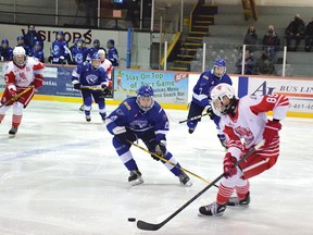 Photo by KEVIN McSHEFFREY/THE STANDARD
Elliot Lake Red Wings forward and Sudbury Cubs Billy Biedermann forward vie for control of the puck during the tightly contested game between the two teams on Friday evening at the Centennial Arena.