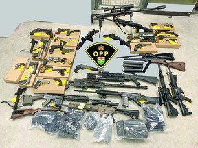 Stash of firearms seized in a Blind River residence earlier this month by East Algoma Detachment of Ontario Provincial Police. OPP PHOTO