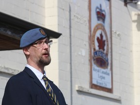 Alex Billings speaks during a vigil for Ukraine held Sunday in the parking lot of the Branch 216 Royal Canadian Legion hall in Petrolia.